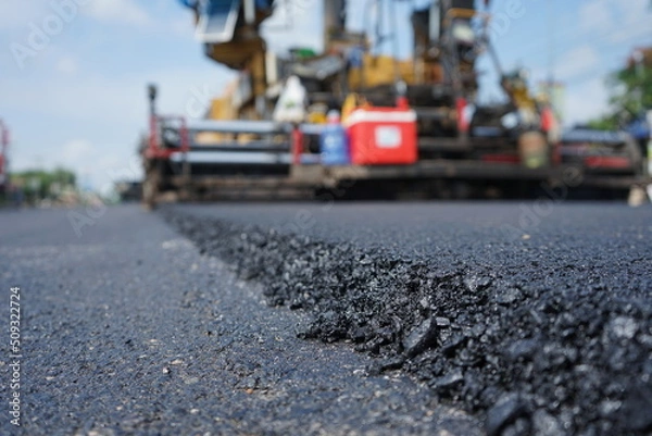 Fototapeta Blurred image of traffic paving work on the highway