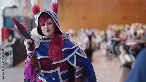 Obraz Home made cosplay mask Xayah from League of Legends pose at comic con