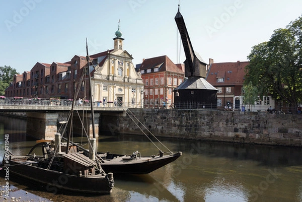 Fototapeta Old harbour of Lüneburg with ancient wooden crane