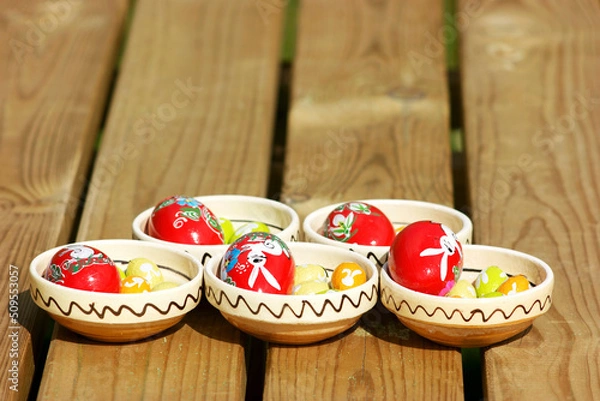 Obraz colorful easter eggs in bowls