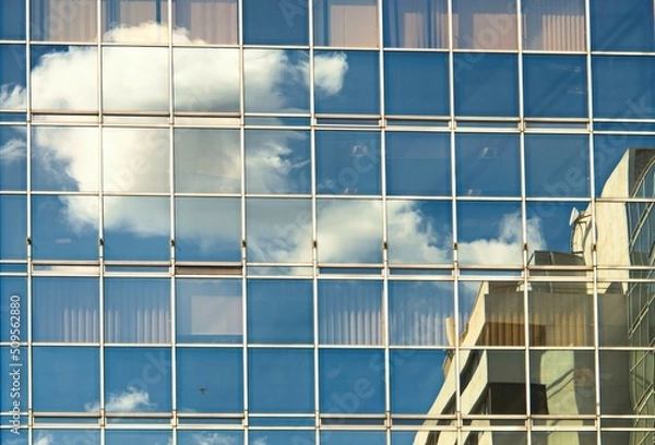 Fototapeta Sky and Clouds reflected in office windows 