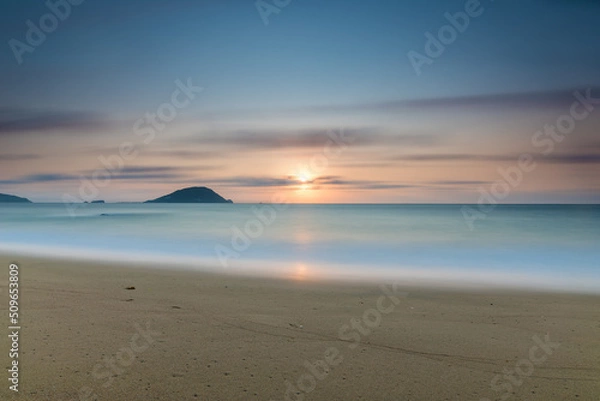 Obraz 水平線に沈む夕日