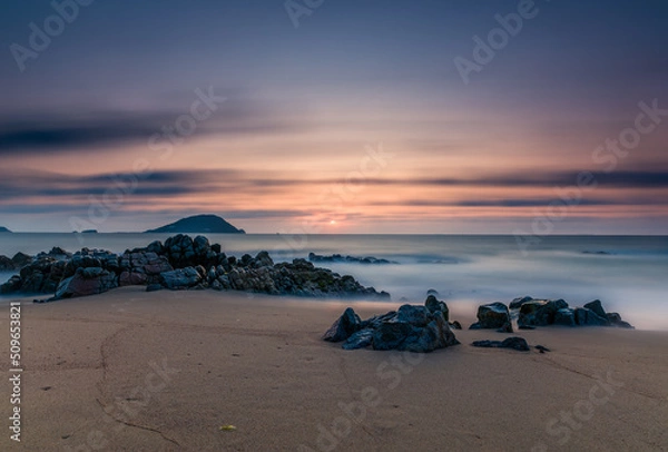Obraz 水平線に沈む夕日