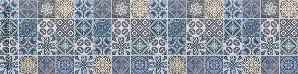 Fototapeta Old blue beige vintage worn geometric shabby mosaic ornate patchwork motif porcelain stoneware tiles, square stone concrete cement tile mirror wall texture background banner panorama..