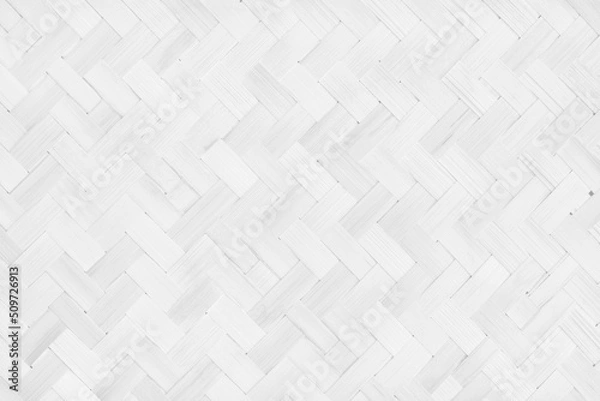 Fototapeta White old bamboo weaving pattern, woven rattan mat texture for background and design art work.