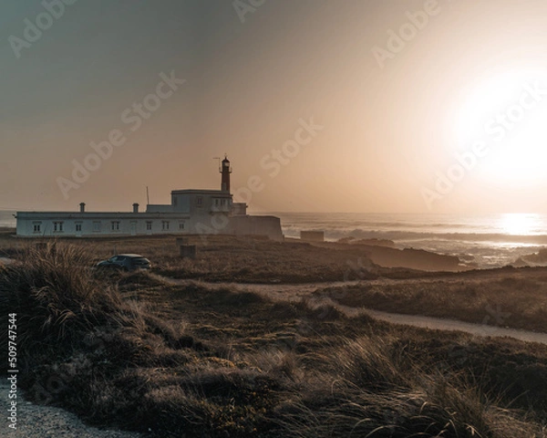 Obraz lighthouse at sunset
