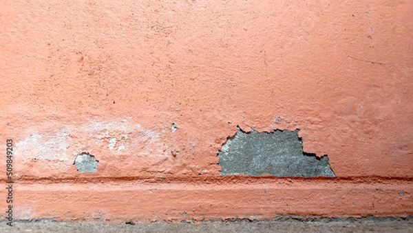Obraz Old wall paint peeling off, making small sheets, deteriorated and decayed.
