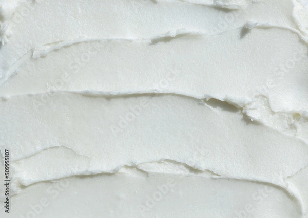 Obraz Raw shea butter texture smudged smear background, thick buttery cream hair and skin care product