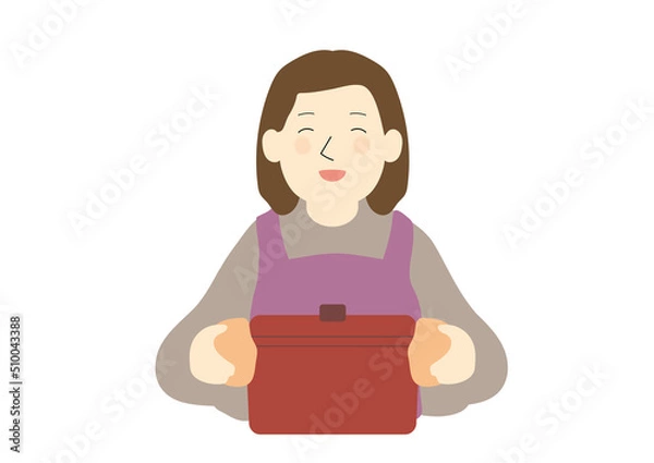 Fototapeta 赤い鋳物の鍋を持って笑う女性