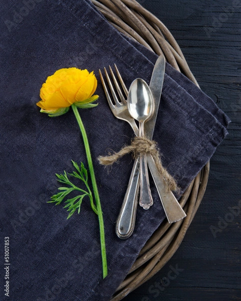 Obraz Rustic dinner setting with with a yellow flower