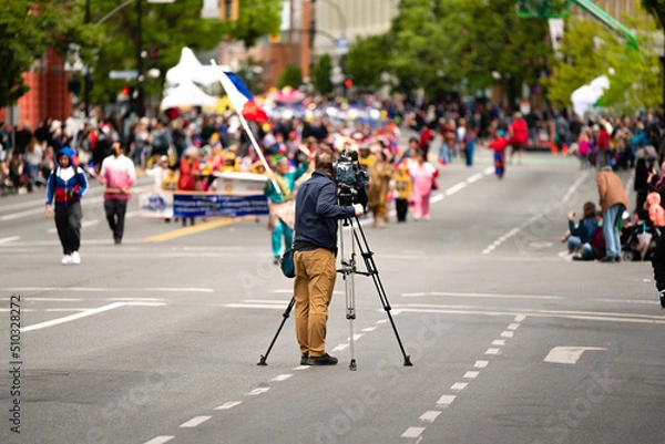 Fototapeta a camera man broadcasting parade