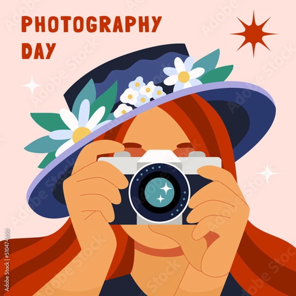 Obraz Girl taking a photo. Redheaded female photographer shooting with a camera and hat decorated with flowers. World photography day. Flat hand drawn cartoon vector illustration