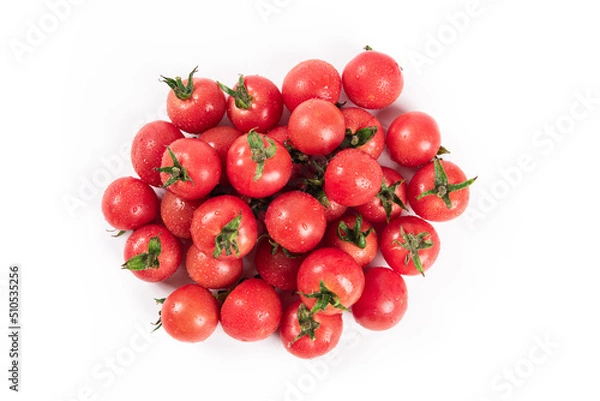 Obraz pile of cherry tomatoes isolated on white background.