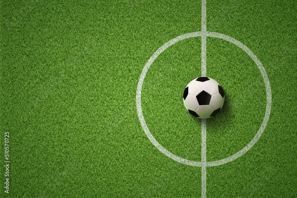 Fototapeta Soccer field or Football field with soccer ball on green grass background