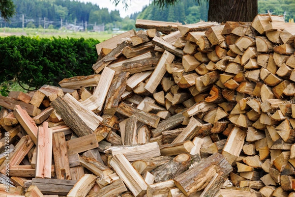 Fototapeta 積み上げられた薪　まき　薪割り　薪ストーブ　燃料