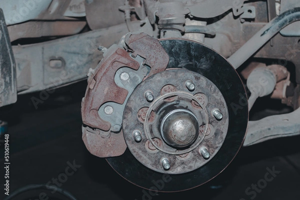 Obraz The mechanic is checking the engine.