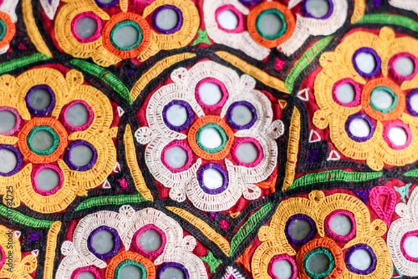 Obraz mirrors and shells at market in Rajasthan, India,multicolour ethnic embroidery,Gujarat india embroidery craft close up view,pakistan embroidery,abhala Bharat or Shisha embroidery