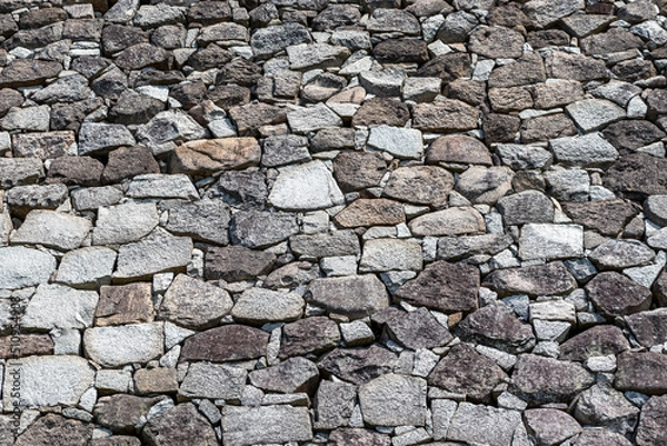 Obraz 積み上げられたたくさんの石でできた壁