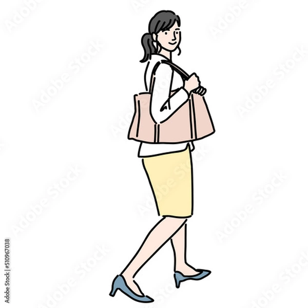 Fototapeta カバンを持って歩いている若いビジネス女性