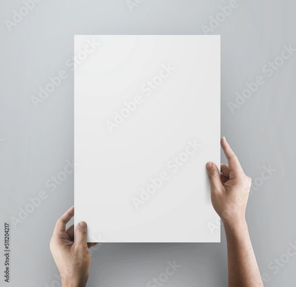 Fototapeta Old hands holding paper blank a4 size.