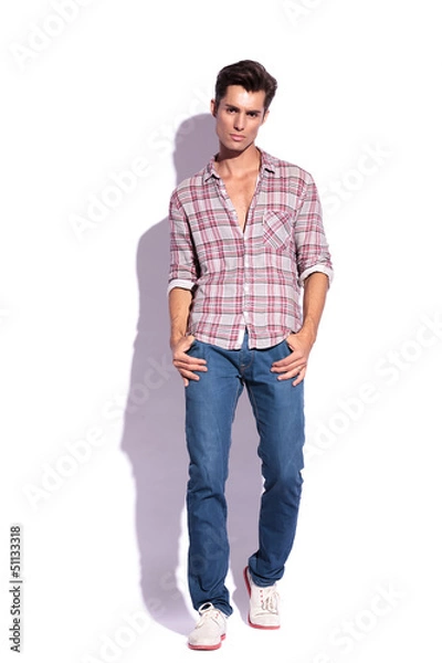 Fototapeta sexy man poses on white