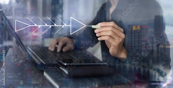 Fototapeta Businessman drawing fishbone diagram for use analysis root cause problem in process and development process at workplace, quality control improvement  concept