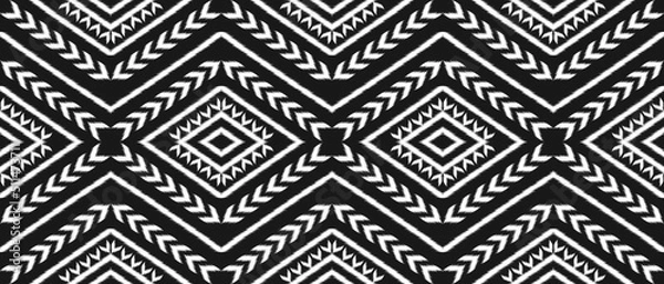 Fototapeta Geometric ethnic ikat seamless pattern traditional. Fabric American, mexican style. Design for background, wallpaper, illustration, fabric, clothing, carpet, textile, batik, embroidery.