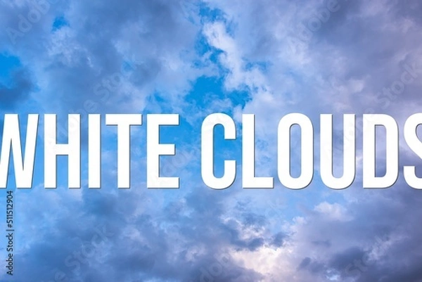 Fototapeta WHITE CLOUDS - word on the background of the sky with clouds.