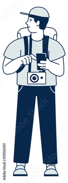 Fototapeta Tourist man with photo camera and backpack standing