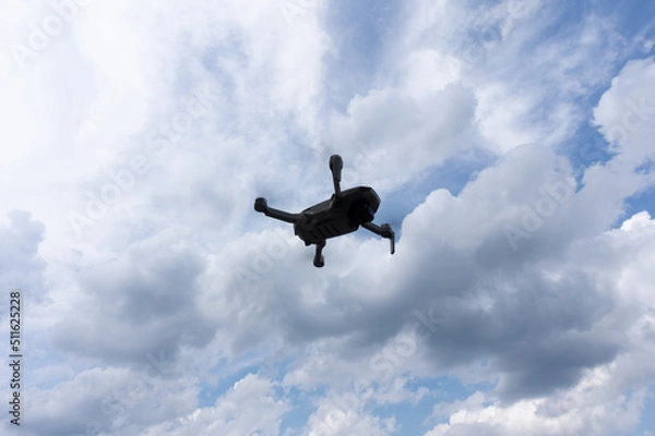Obraz A drone in the blue sky background