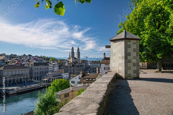 Obraz Aerial view of historic Zurich city center with famous Grossmunster Church and river Limmat from Lindenhof park, Zurich, Switzerland. Summer landscape, sunshine weather, blue sky and sunny day