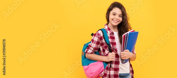 Fototapeta day in high school. schoolgirl with notebook and backpack. back to school. teen girl ready to study. Banner of school girl student. Schoolgirl pupil portrait with copy space.