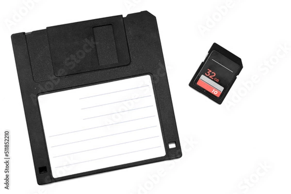 Fototapeta retro floppy disk and modern memory card in black on white background