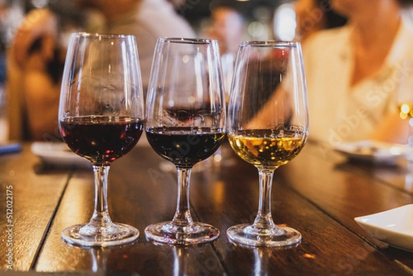 Fototapeta Three glasses of port wine in wine glasses at a wine tasting