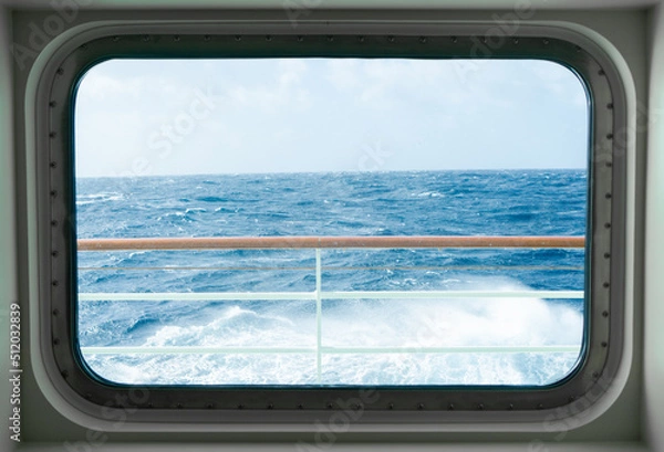 Fototapeta View from a cabin window of a cruise ship on the stormy sea
