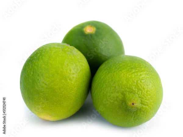 Obraz Fresh ripe green limes isolated on white background. (clipping path)