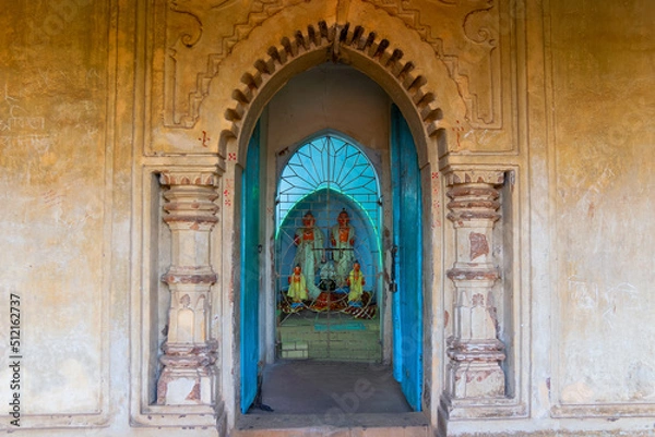Fototapeta Deities at Radhashyam Temple - made of terracotta (fired clay of a brownish-red colour, used as ornamental building material) artworks at Bishnupur, West Bengal, India. Popular UNESCO heritage site.