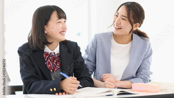 Obraz 制服の女子学生と塾講師