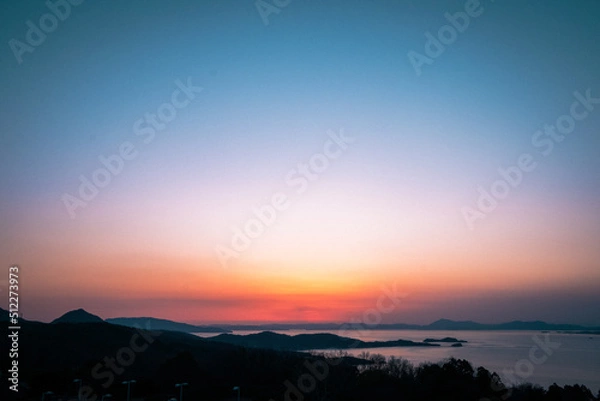 Fototapeta Sunset over the sea in Japan