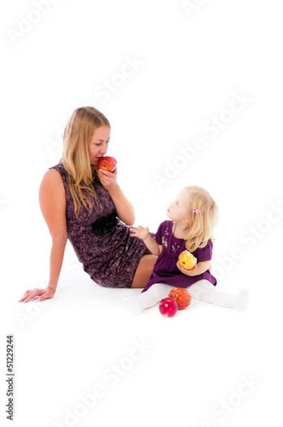Fototapeta mother with the daughter apple on a white background.