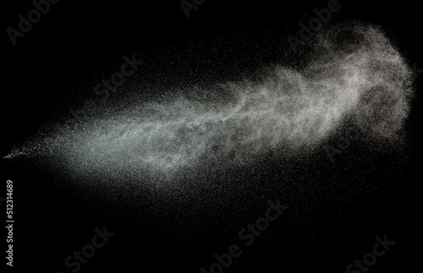 Obraz Sprayed water. Splashes and drops of water isolated on black background.
