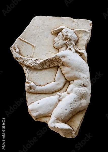 Fototapeta Ancient decoration element with sculpted man isolated on black. Elements of architectural decorations of buildings, gypsum stucco, On the streets in Jelsa, island Hvar, Croatia, public places