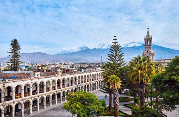 Fototapeta Arequipa, Peru. The main square of the city and a view of the Andes.