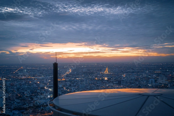 Fototapeta sunset over the city