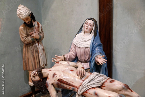 Fototapeta Iglesia del sagrario (old cathedral of Cuenca), Cuenca, Ecuador. Piety, attributed to Miguel Velez school, polychrome wood, 19th century