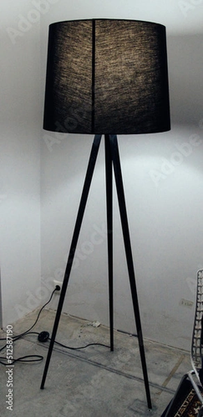 Fototapeta floor lamp in the room against the wall on the floor