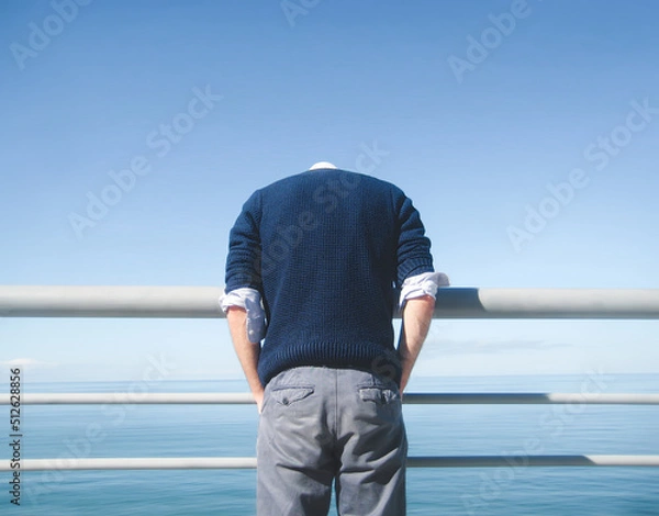 Fototapeta view of man standing on the beach