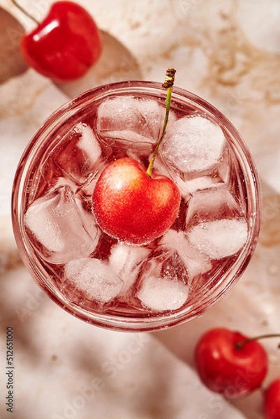 Obraz refreshing lemonade with ice and cherries