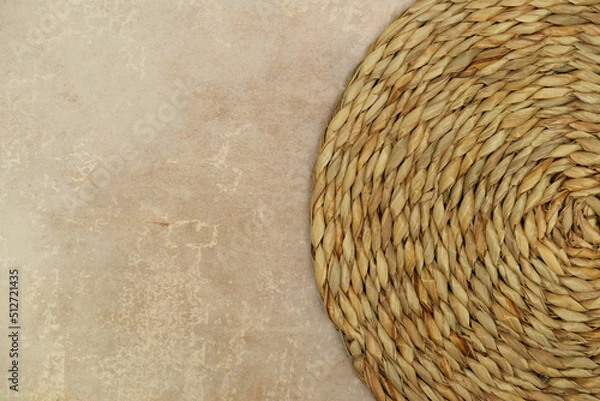 Fototapeta Dried Grass Straw Circular Woven Matt on Vintage Worn Background