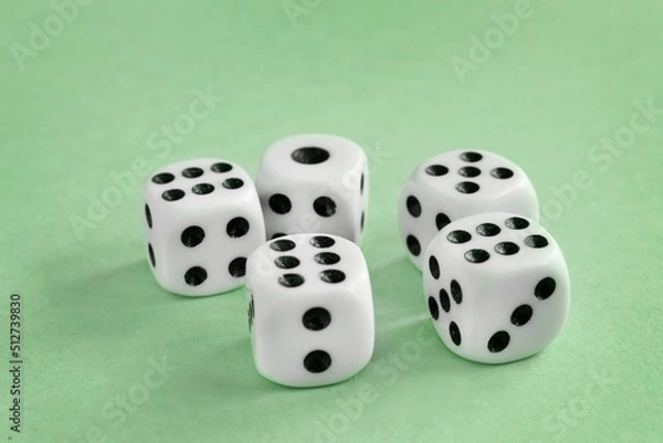 Fototapeta Dice on green background